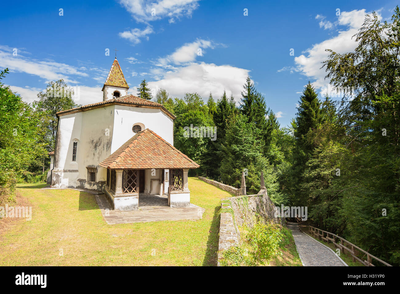Small church of 14 century Friulian Alps, Italy. Stock Photo
