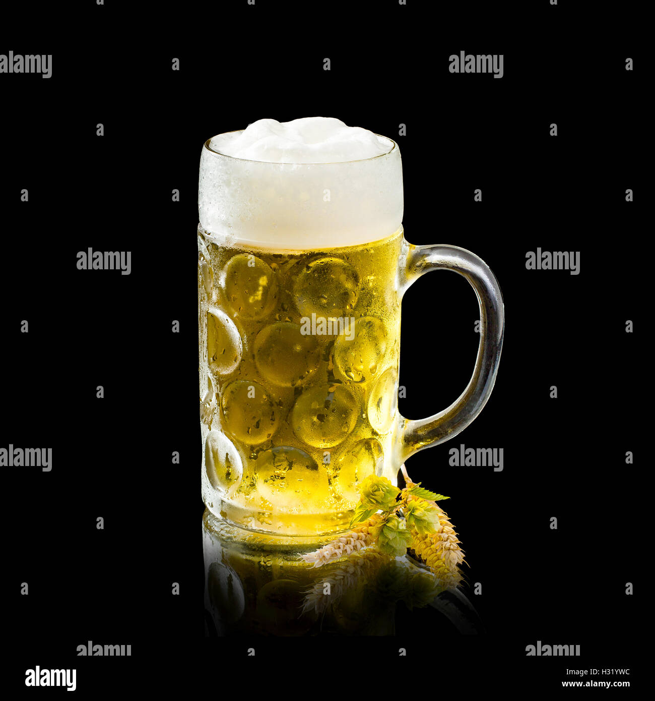 Oktoberfest beer mug, wheat, hops isolated on black Stock Photo Alamy