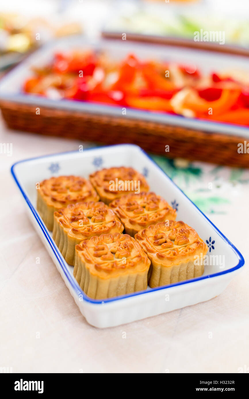 Oriental mooncakes in a china dish. Stock Photo
