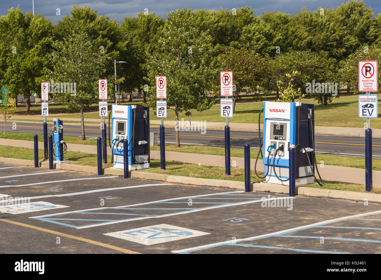 The Nissan Stadium Charging Zone, for electric vehicle charging, in a parking lot for Nissan Stadium in Nashville, Tennessee. Stock Photo