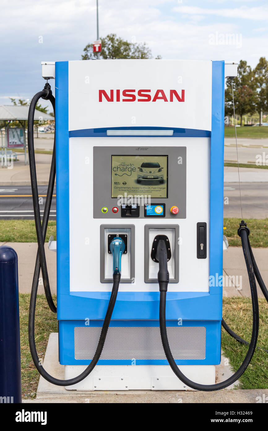 An nrg EVgo electric vehicle charging station in the Nissan Stadium Charging Zone, at Nissan Stadium in Nashville, Tennessee. Stock Photo