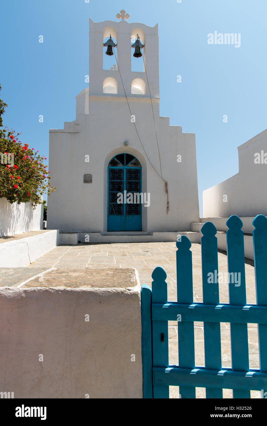 Traditional orthodox white small church with belfry in the Greek island of Sifnos in Greece Stock Photo