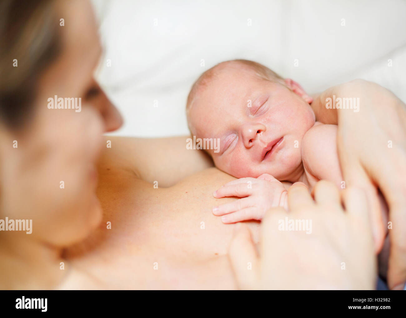 Newborn baby Aged 11 Days and mother Stock Photo