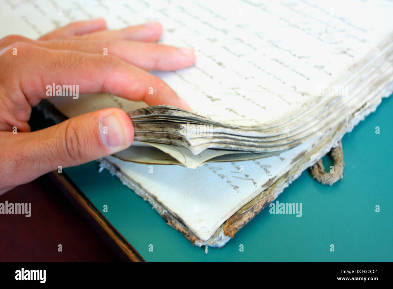 antique document with damage on pages Stock Photo - Alamy