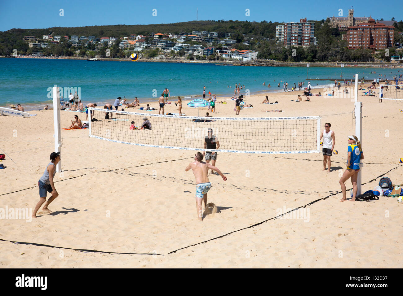 Teams playing beach volleyball on Manly Beach in Sydney,Australia Stock Photo