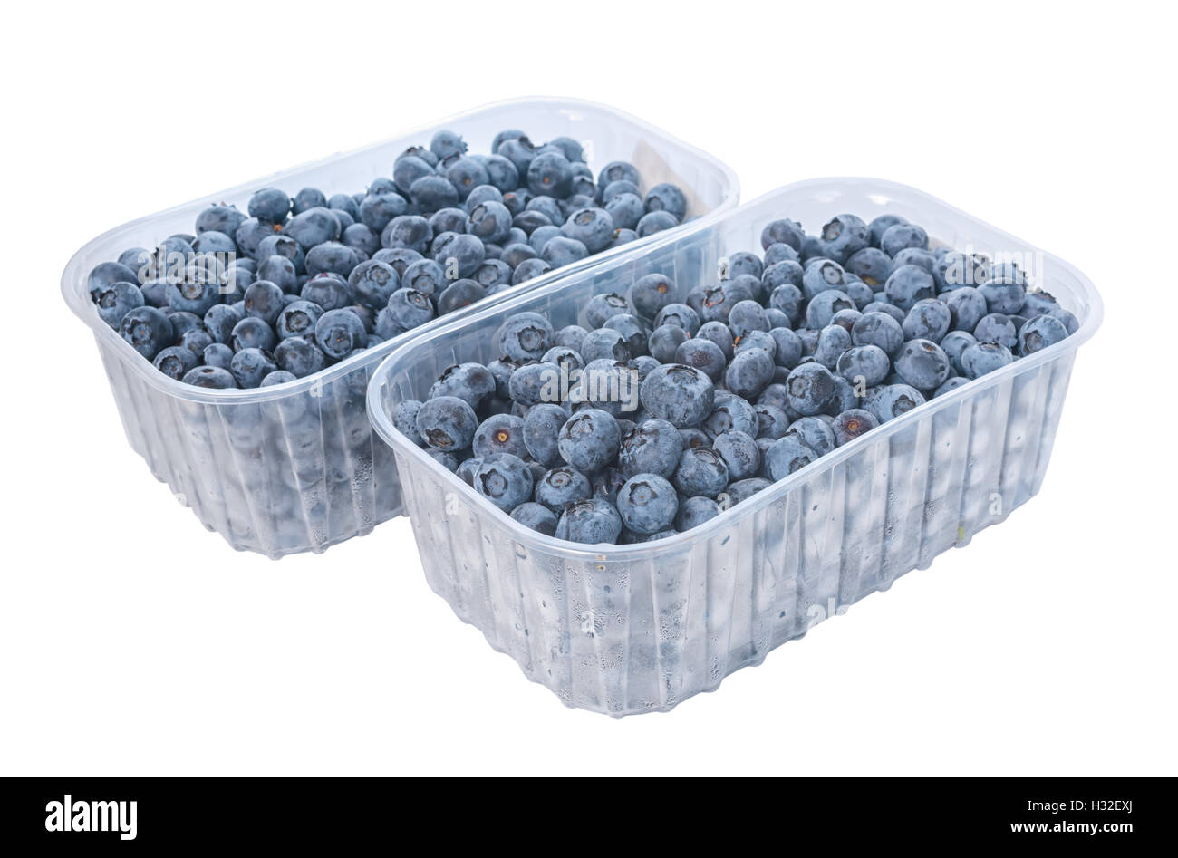 blueberry in box containers at farmers market is isolated on white background, close up, concept of healthy eating and nutrition Stock Photo