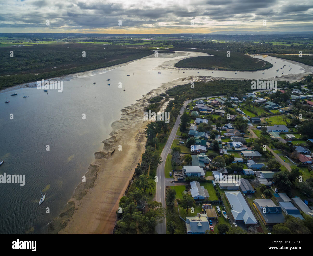 Aerial view of Warneet suburb, Rutherford creek and moored fishing ...