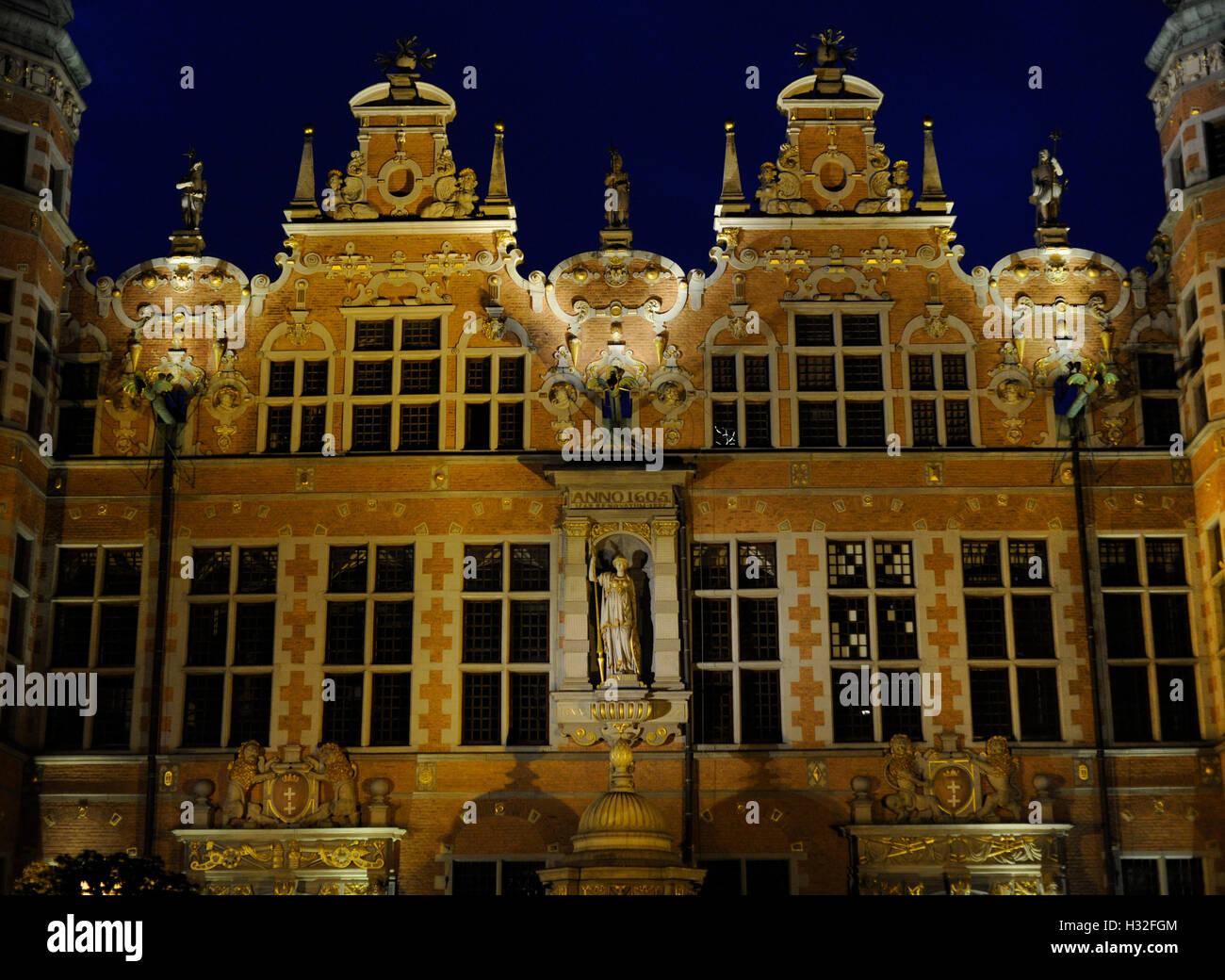 Poland. Gdansk. Great Arsenal. 17th centry. Mannerist. Architect Anthony van Obbergen (1543-1611). Night view. Stock Photo