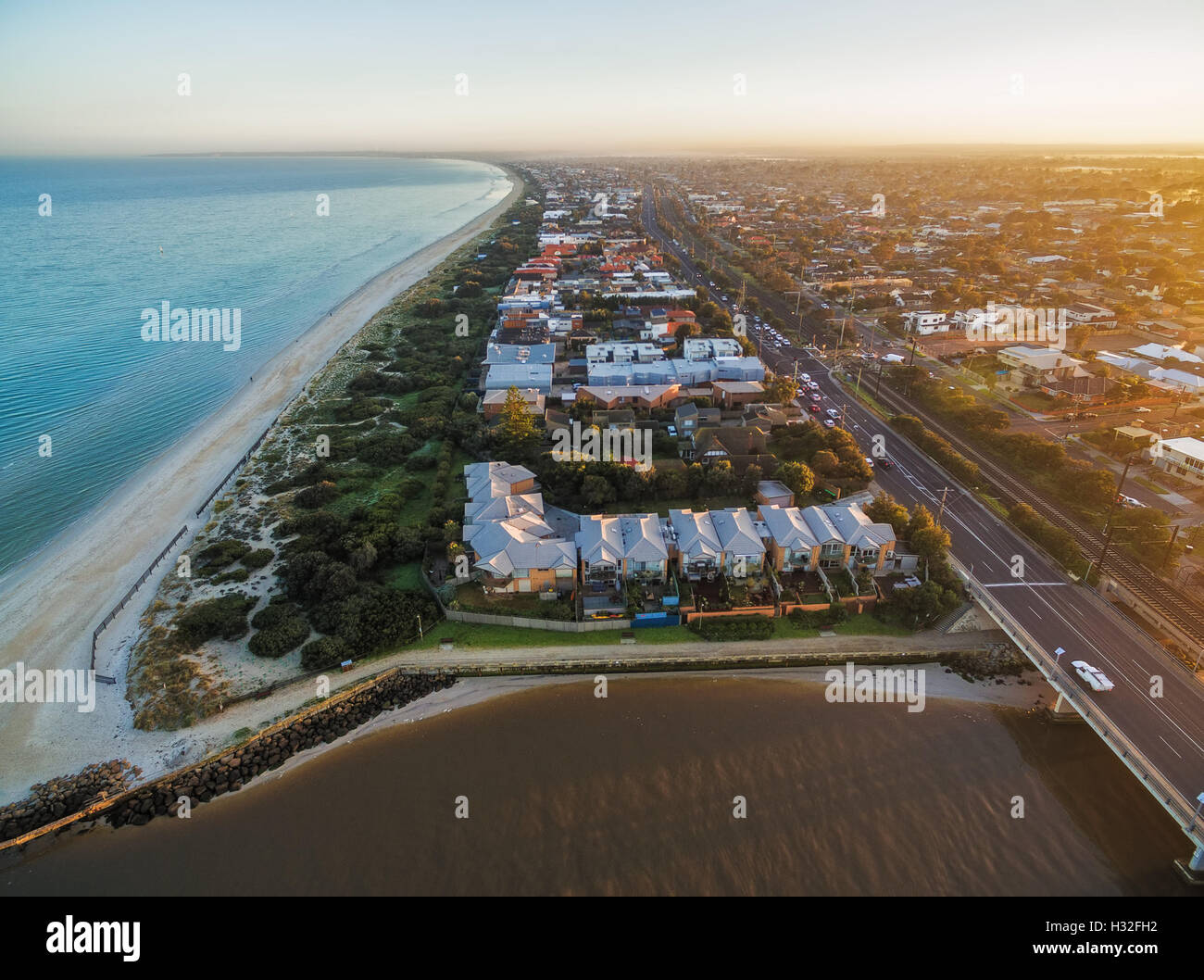 Aerial view of Patterson Lakes suburb, Nepean Highway, and coastline at