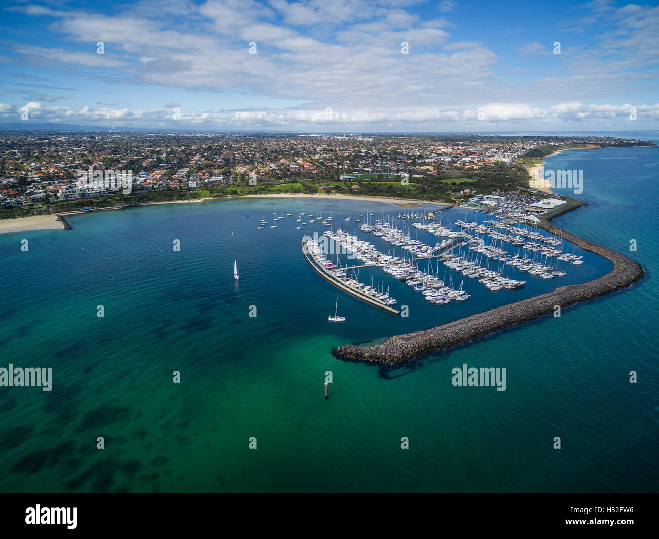 Aerial image of Sandringham Marina and Yacht Club with suburban landscape in the background. Melbourne, Victoria, Australia Stock Photo