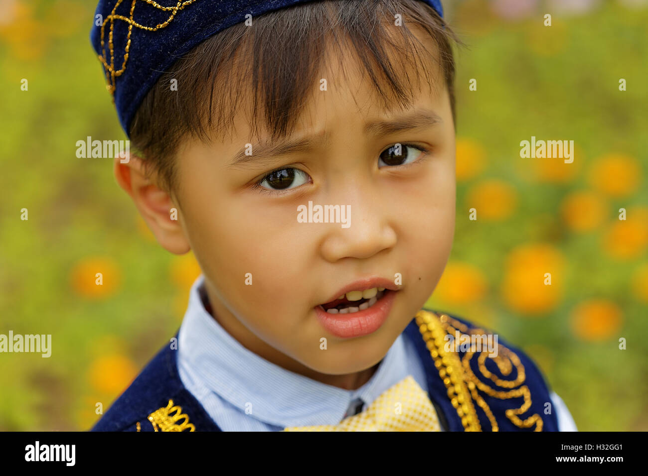 pretty little kazakh boy in national costume Stock Photo