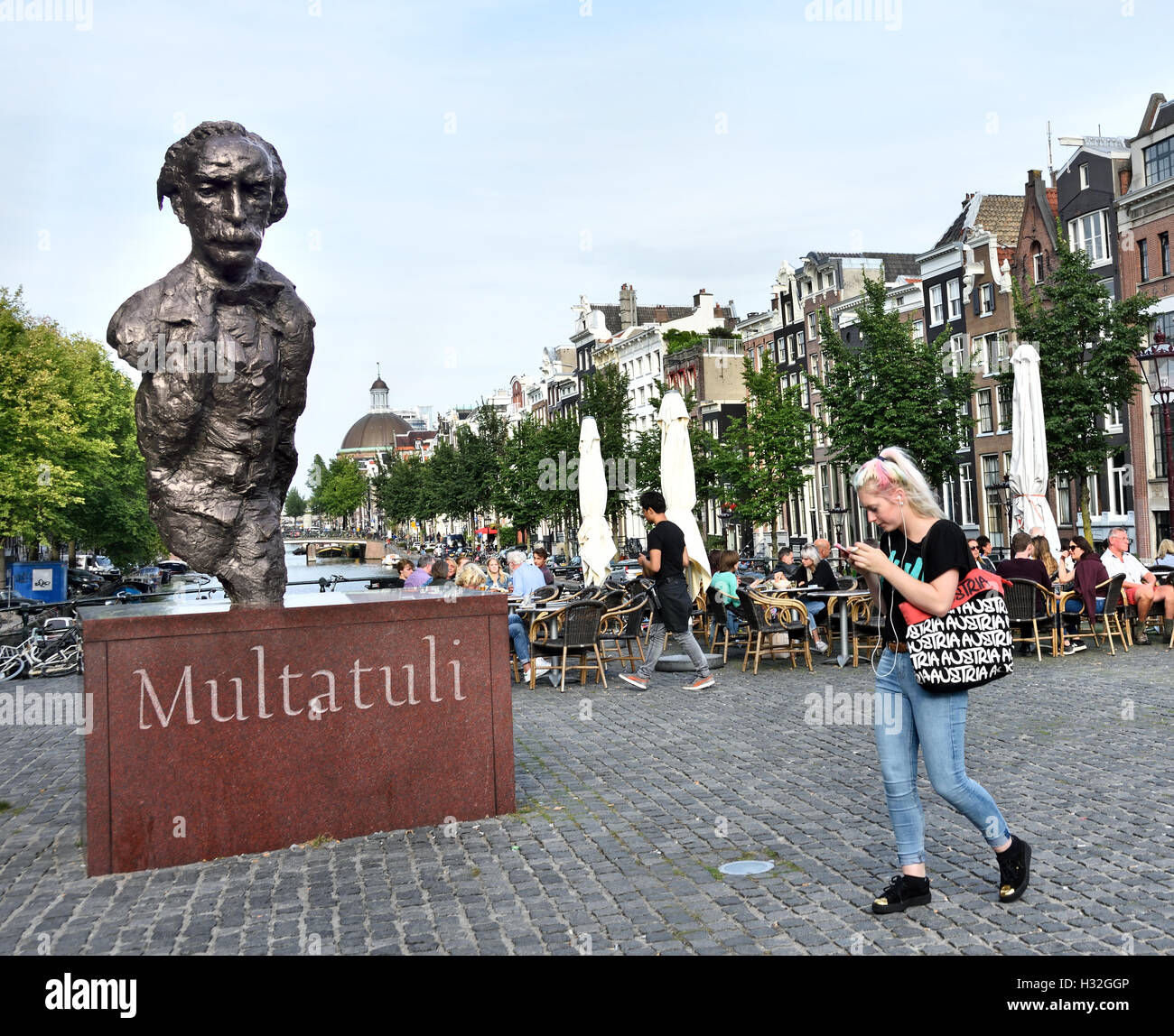 Multatuli Eduard Douwes Dekker 1820 – 1887 better known by his pen name Multatuli  Amsterdam Dutch Netherlands ( Statue of Multatuli on a square over the Singel canal in Amsterdam ) Stock Photo