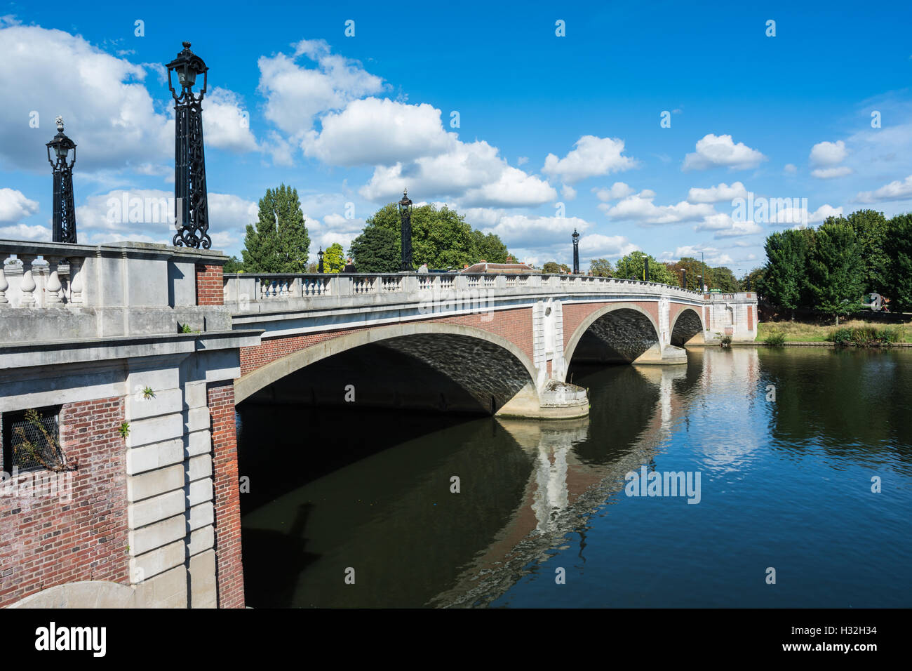 Hampton Court Bridge, on the River Thames, opposite Hampton Court Palace in Surrey, UK Stock