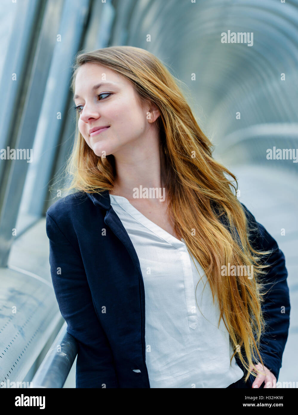 Outdoor portrait of a pretty dynamic junior executive Stock Photo