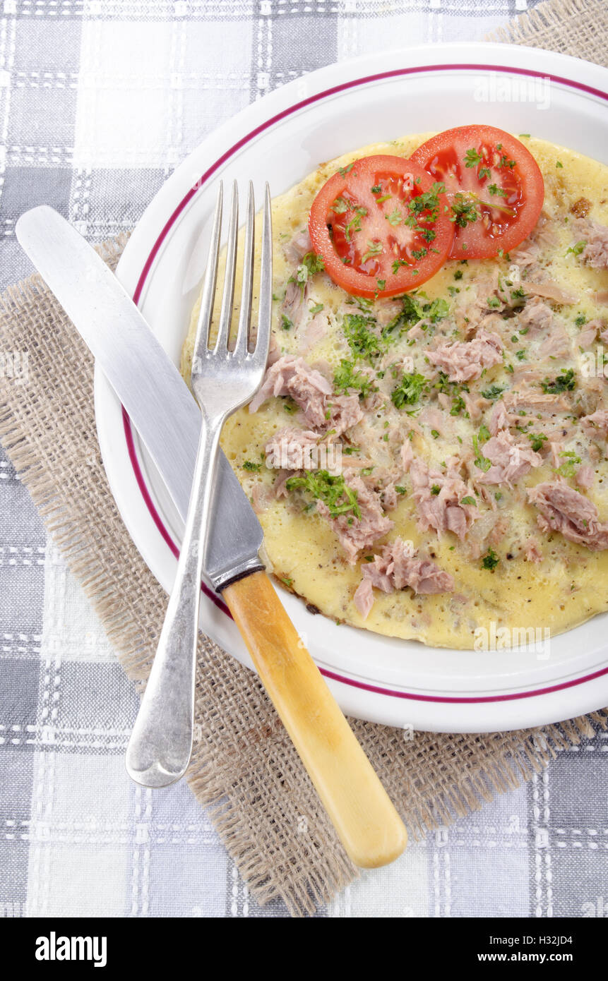 tuna omelette with parsley and tomato Stock Photo - Alamy