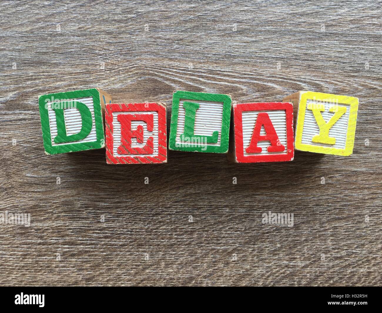 alphabet-wood-block-letters-forming-the-word-delay-it-is-a-way-for-young-kids-to-learn-english