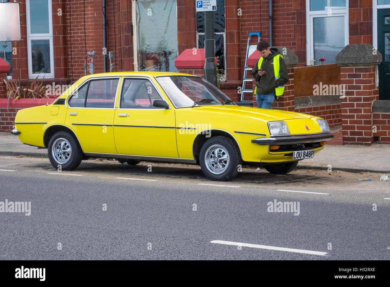 A yellow 1975 Vauxhall Cavalier car used in filming Making Noise Quietly in Redcar Cleveland North Yorkshire UK Stock Photo