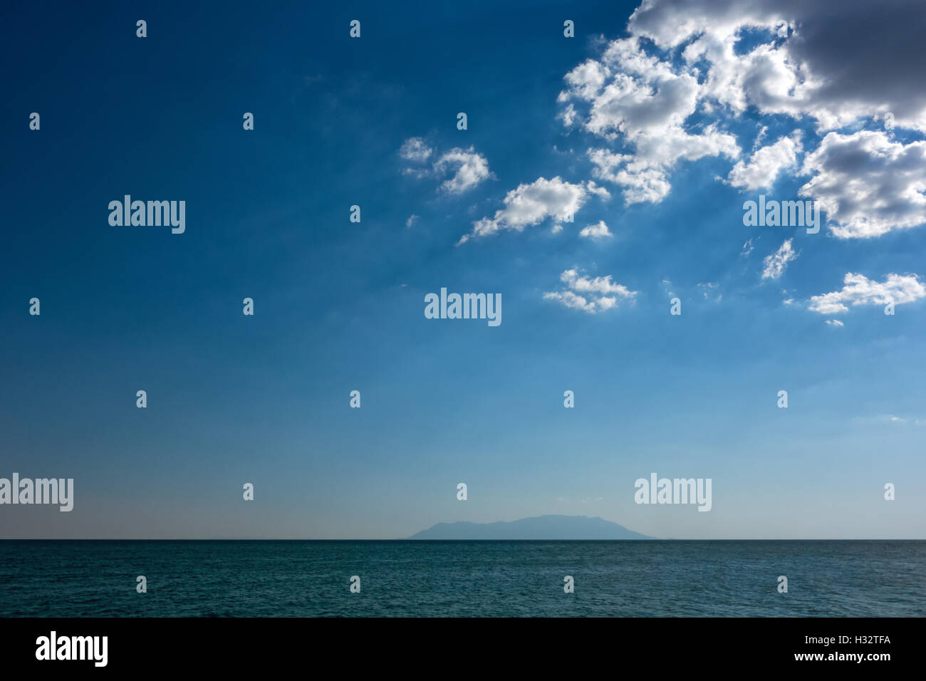 Blue sky with clouds over sea. Nature composition Stock Photo - Alamy