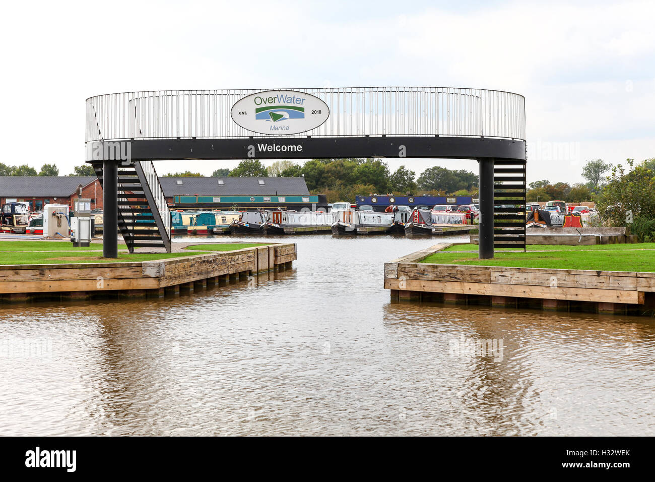Bridge at the entrance to the Overwater Marina on the Shropshire Union Canal at Audlem Cheshire England UK Stock Photo