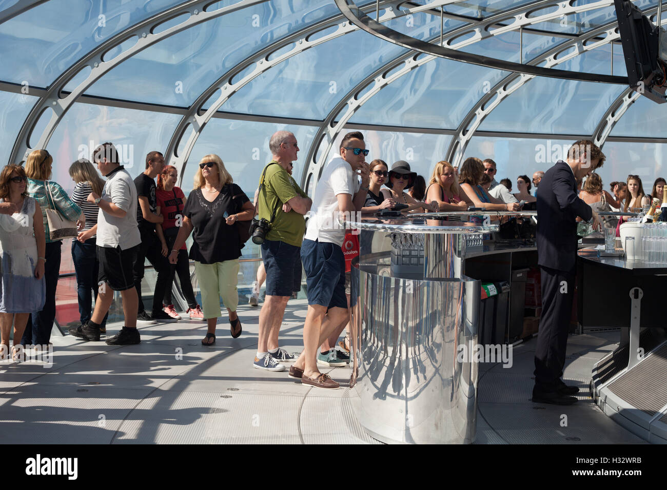 People having a drink at the bar Inside the British Airways i360 viewing platform, Brighton, Sussex, UK Stock Photo