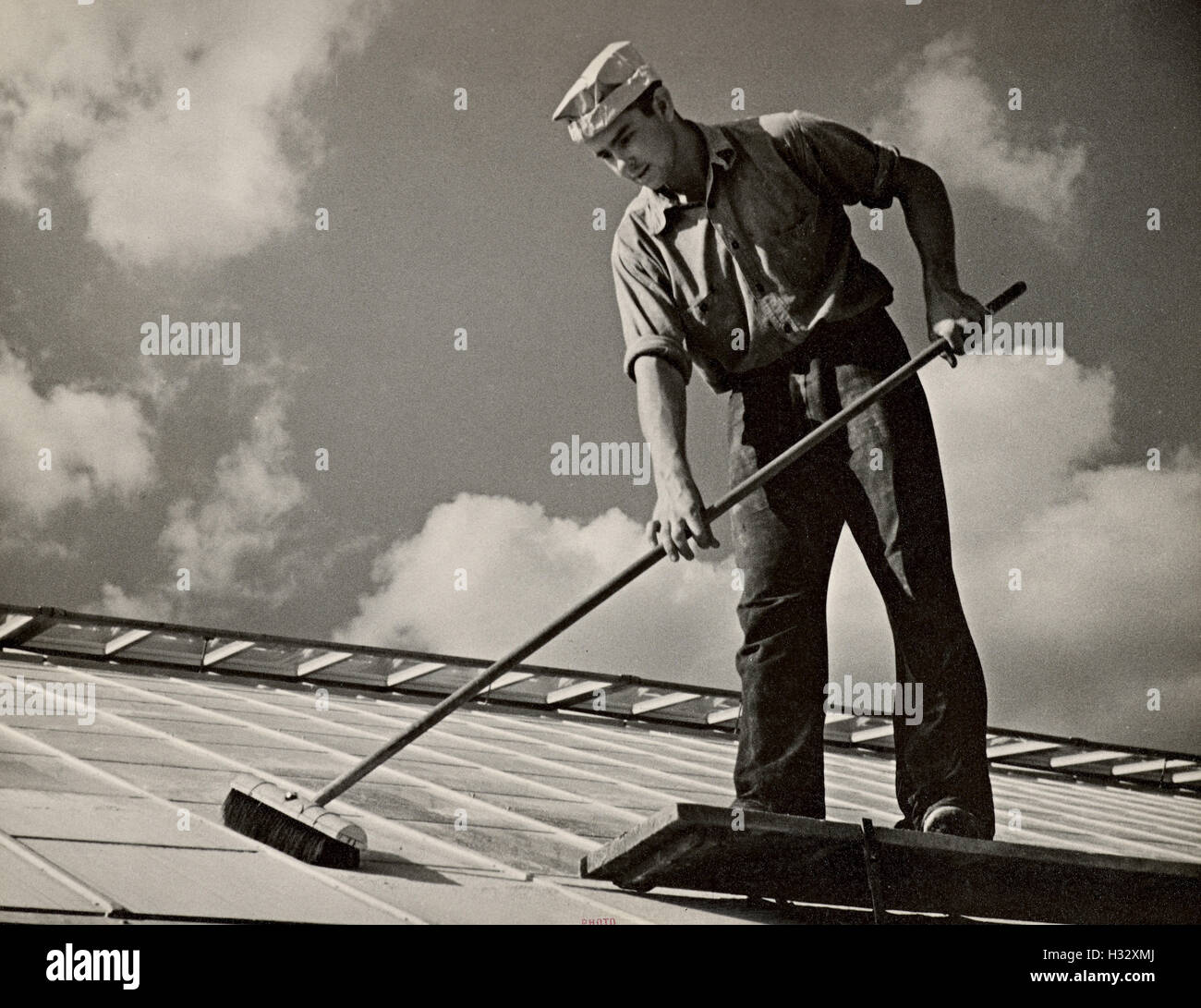 Cleaning glass in greenhouse, Experimental Farm, USA Stock Photo Alamy