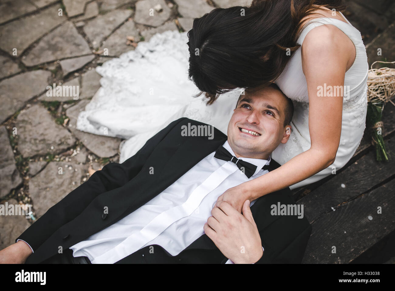 Bride on groom lap hi-res stock photography and images - Alamy