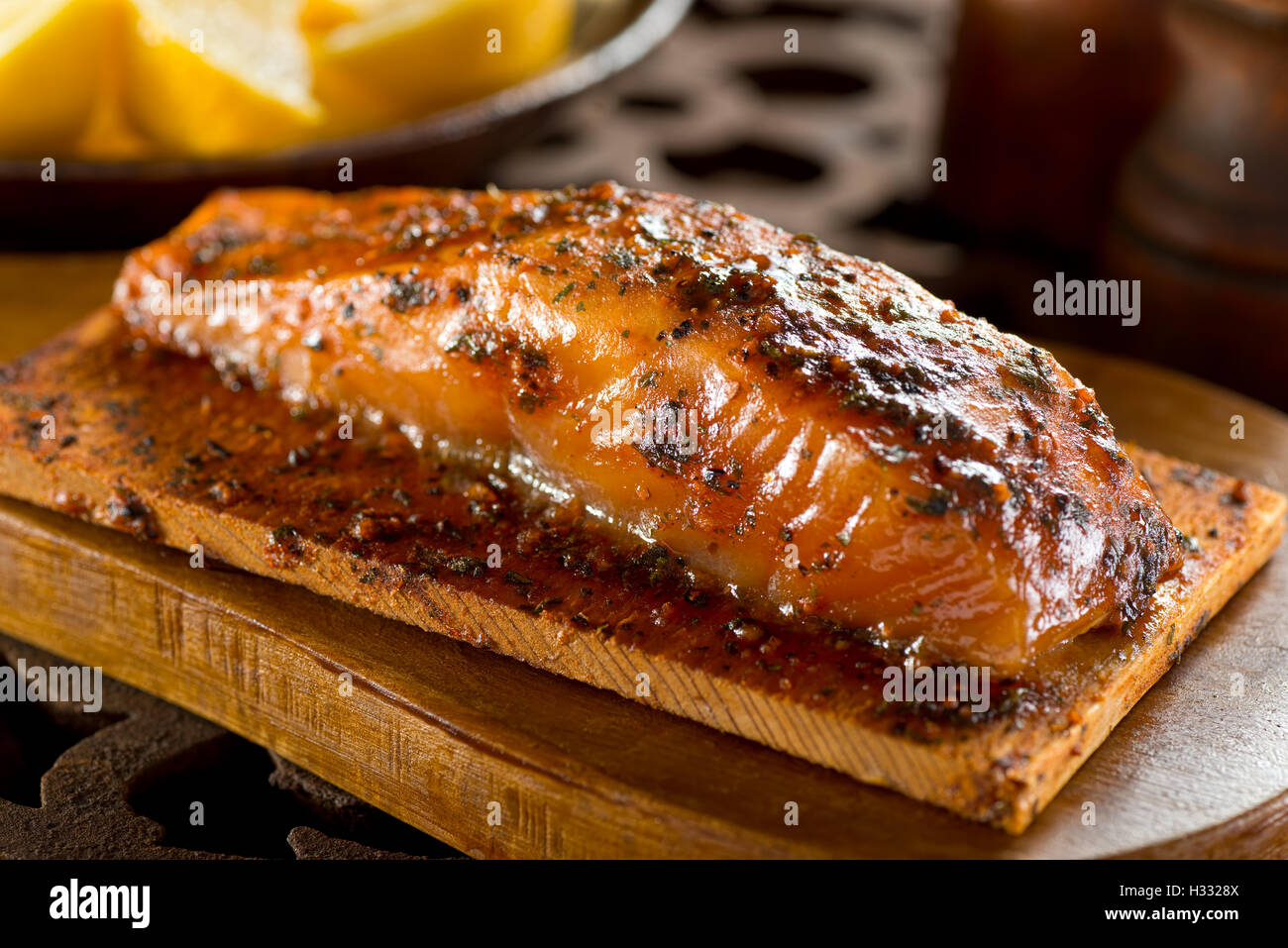 A single serving portion of delicious cedar smoked salmon. Stock Photo