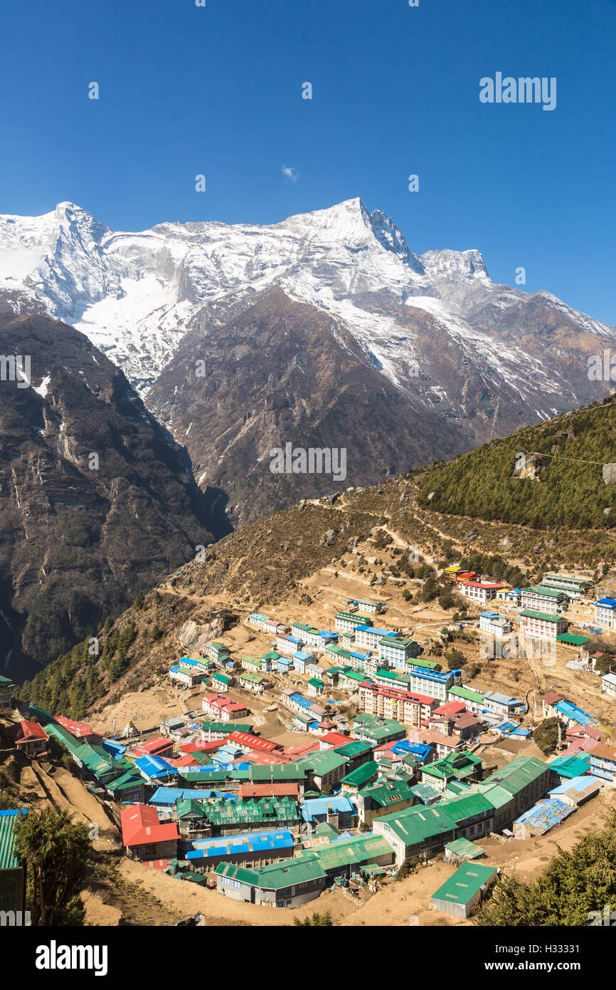 Namche Bazar in Nepal is the main village in the Khumbu region in the Himalayas on the populair hiking tail that leads to the Ev Stock Photo