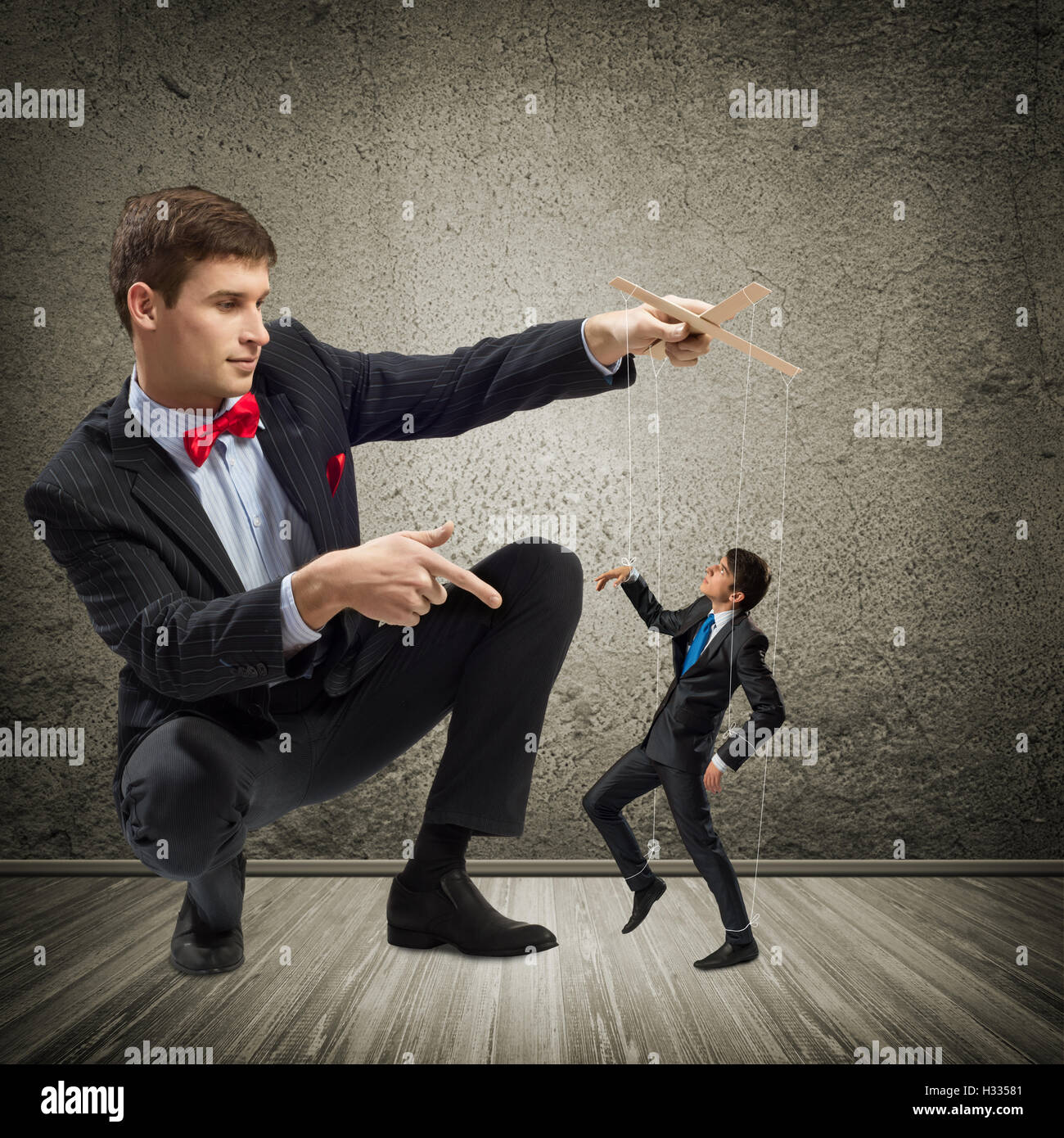 puppeteer and puppet business Stock Photo Alamy