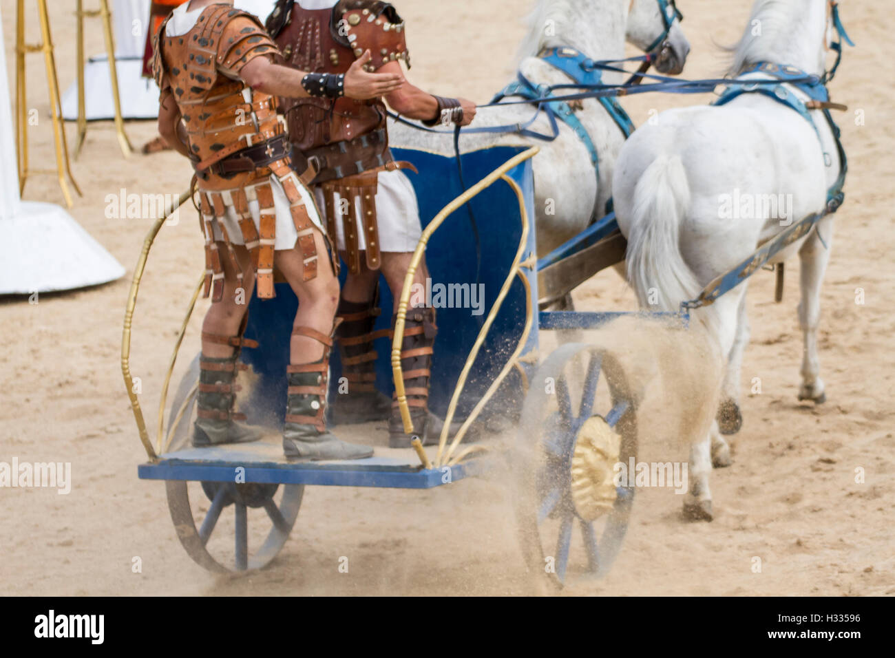 Warriors, Roman chariot in a fight of gladiators, bloody circus Stock Photo