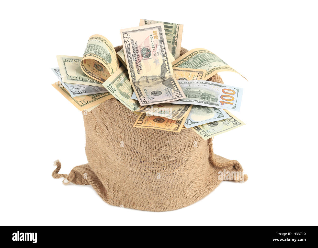 Full sack with dollar bills. Stock Photo