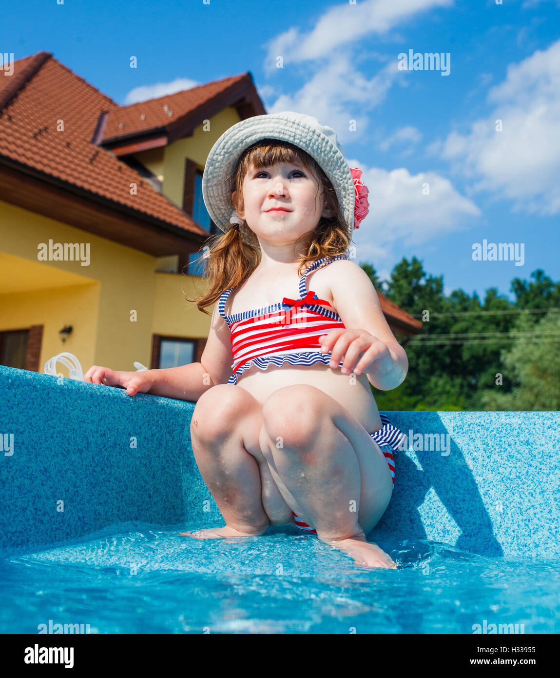 Girl in the pool Stock Photo