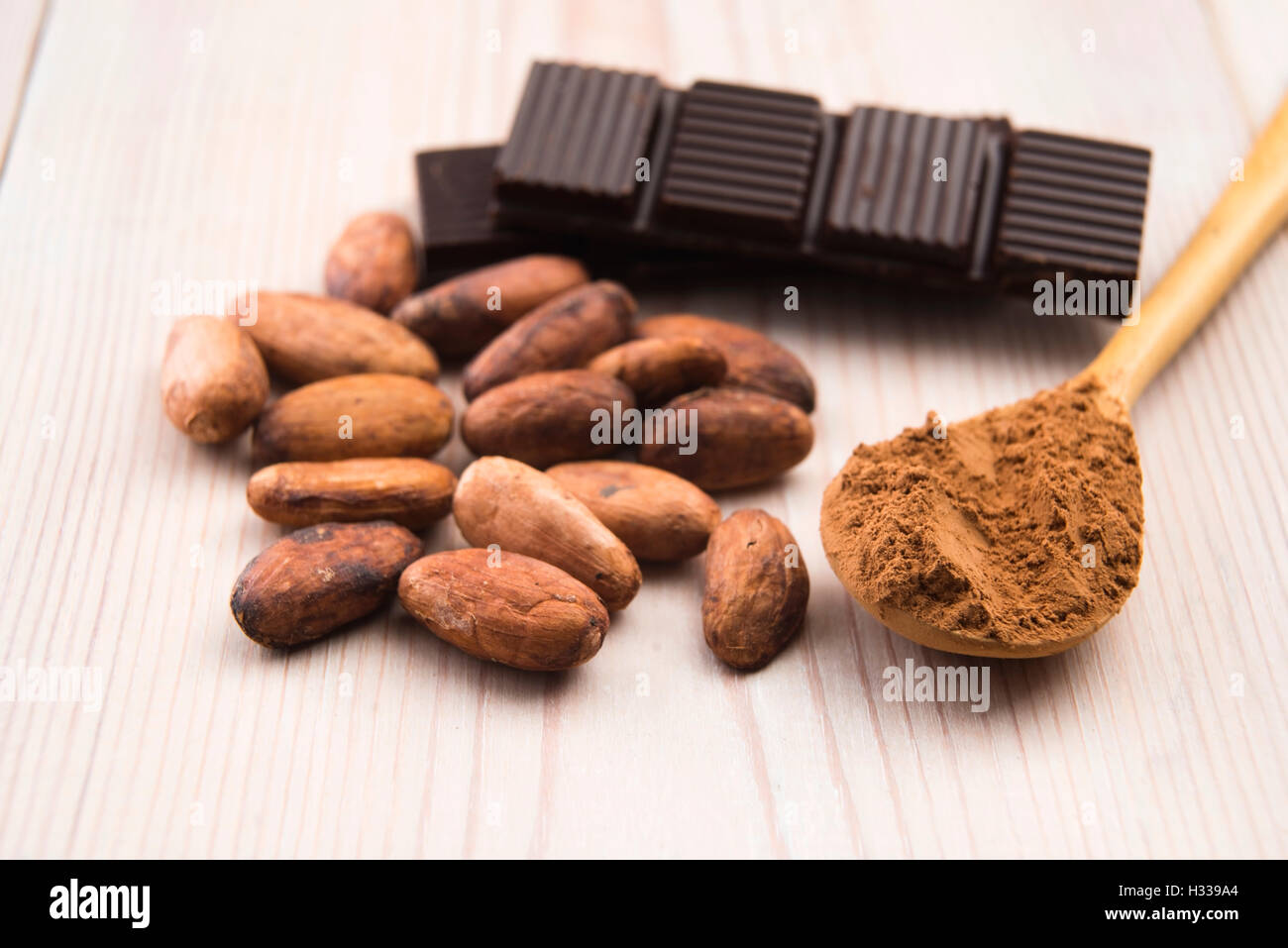 Cocoa (cacao) beans with chocolate Stock Photo Alamy