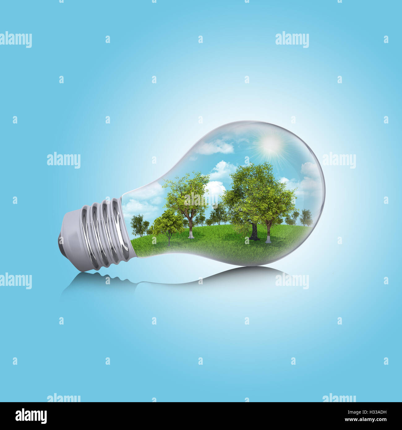 Trees, grass and sky in the light bulb Stock Photo Alamy
