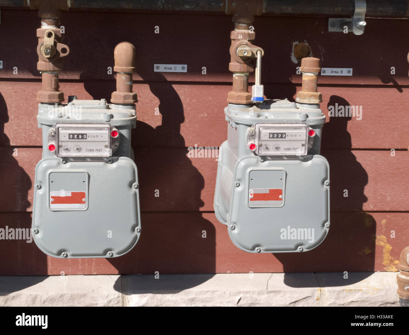 Exterior wall natural gas consumption meters Stock Photo Alamy