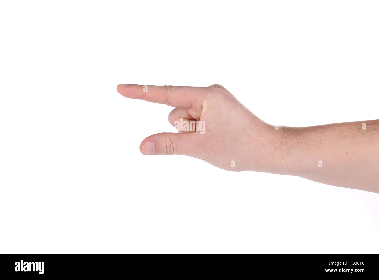 Male hand showing something small Stock Photo - Alamy