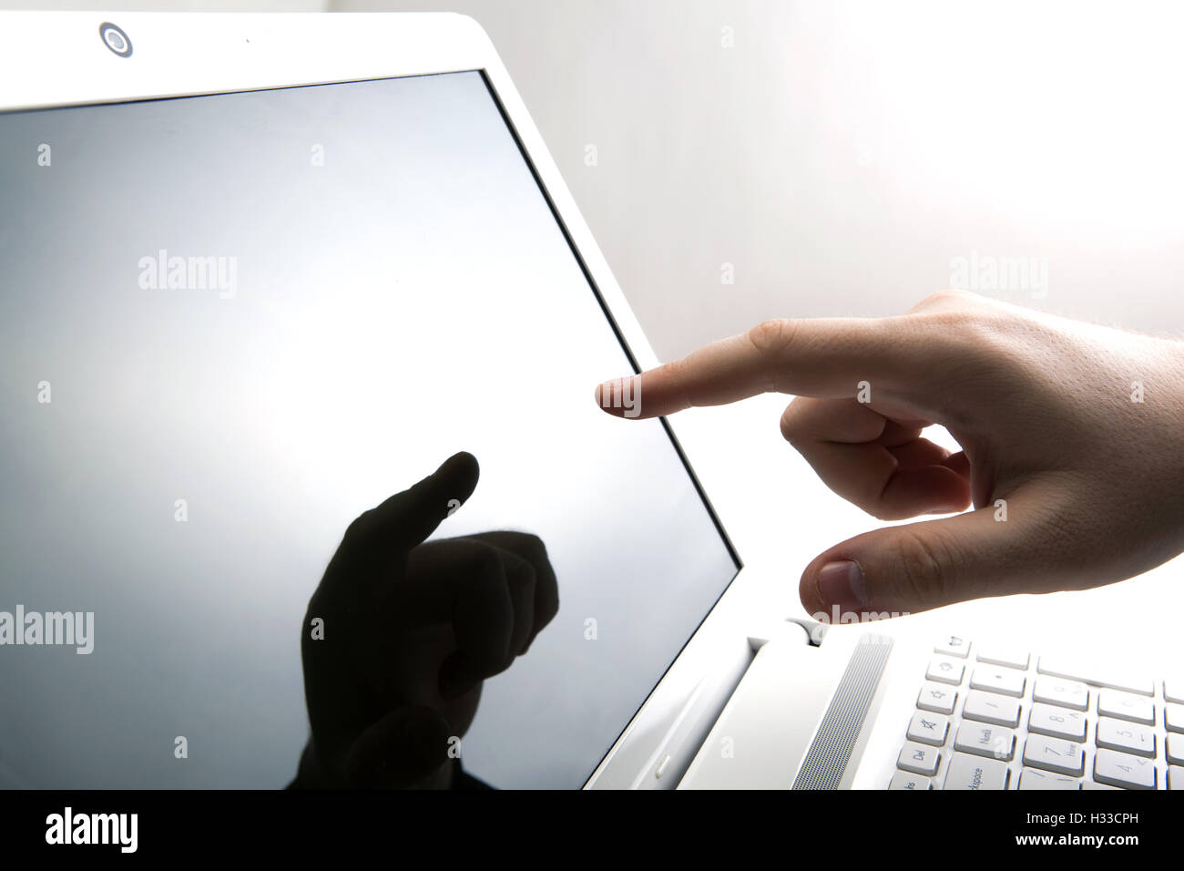 human fingers on the Tablet PC Stock Photo - Alamy