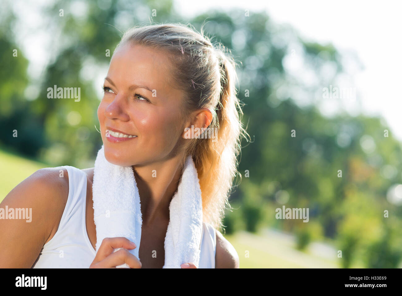 attractive woman with a white towel Stock Photo - Alamy