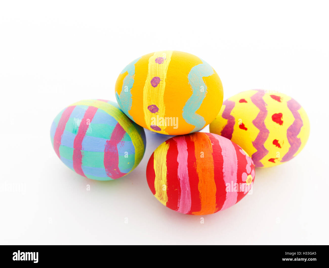 Colourful painted easter egg isolated on white Stock Photo - Alamy