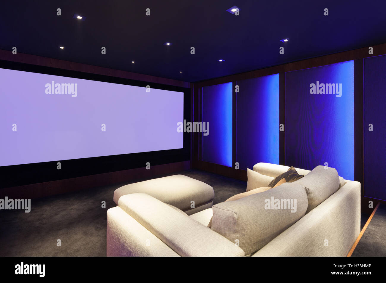 Visual Reference: Home Theater Luxury Interior Comfortable Divan And Big Screen Stock