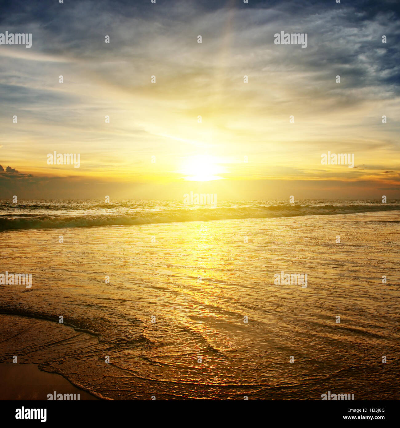 sunrise over the ocean Stock Photo - Alamy