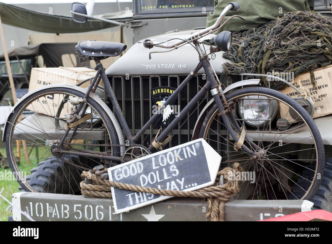 Bicycle on a US Army Jeep with signs Stock Photo