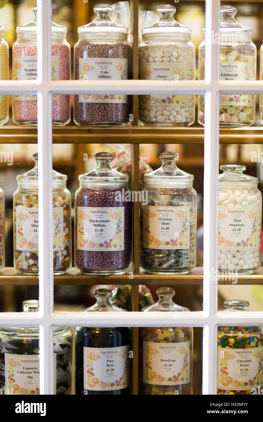 Sweet jars on shelves Stock Photo Alamy