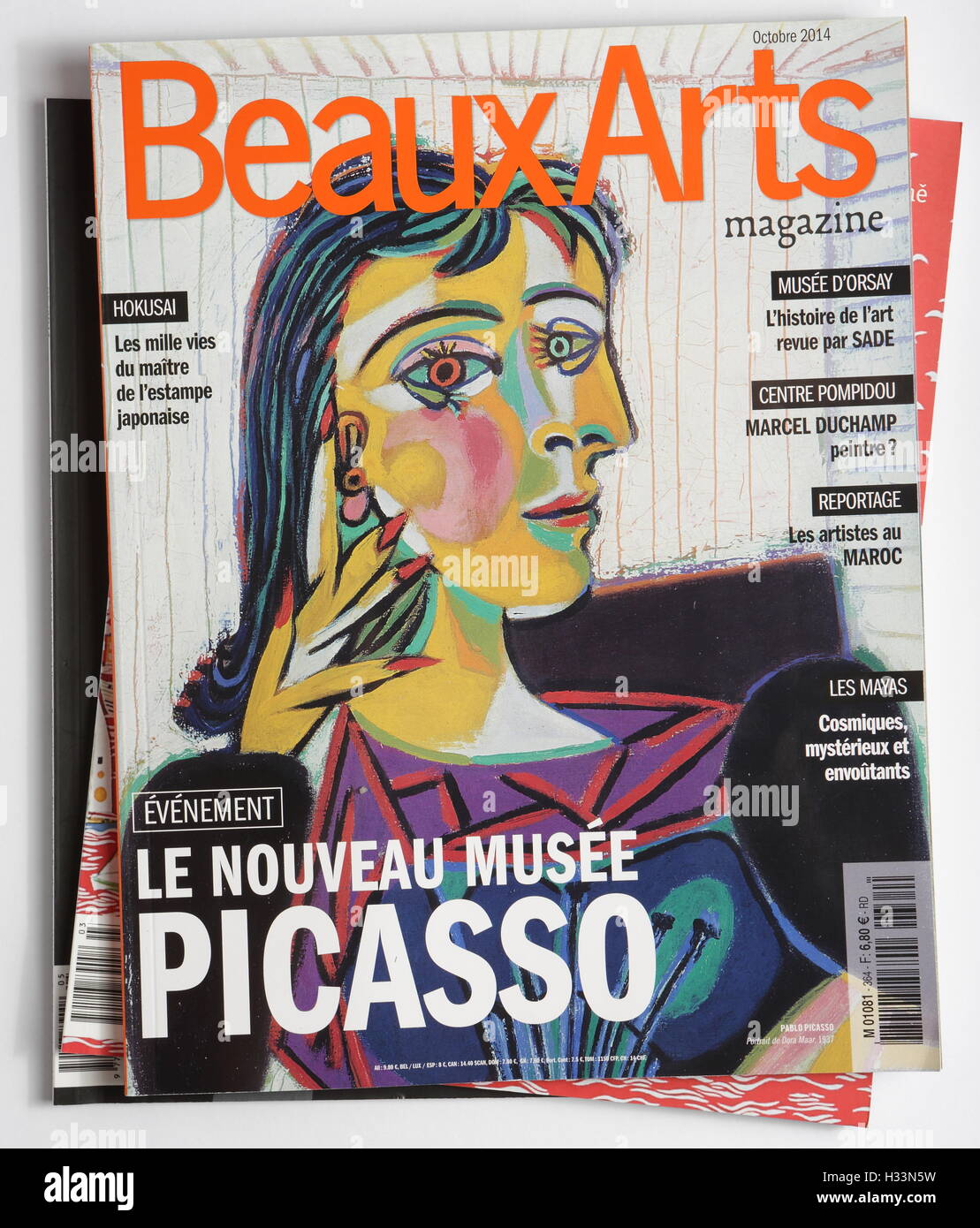 FRANCE - OCTOBER 2, 2014: Stack of French magazines Beaux Art, on top issue Octobre 2014 with the work of Pablo Picasso Portrait Stock Photo