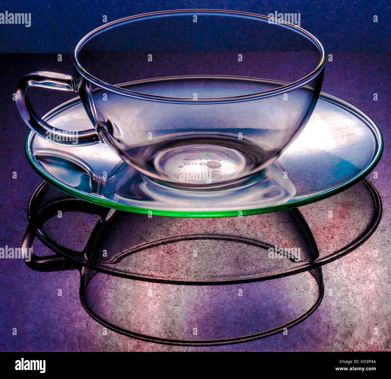 Clear glass see through Teacup with saucer Stock Photo Alamy