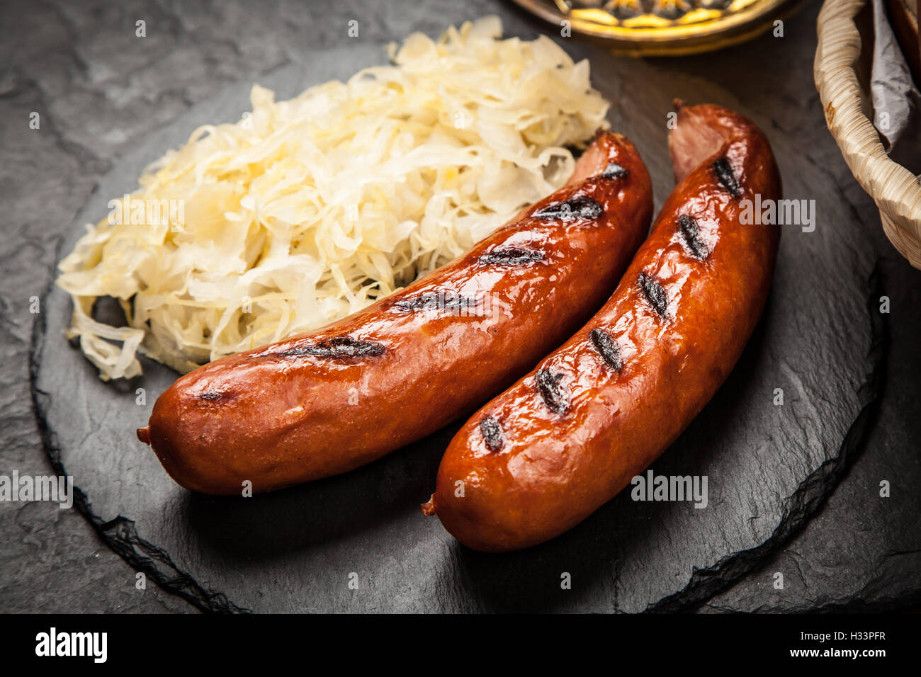 Pretzels, bratwurst and sauerkraut Stock Photo