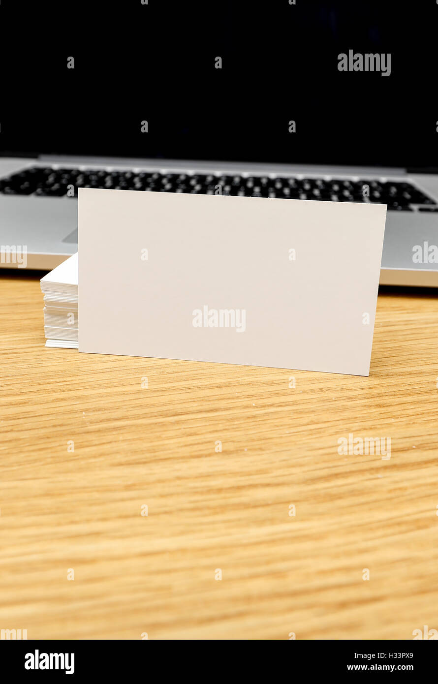 Modern desk with laptop and tablet Stock Photo