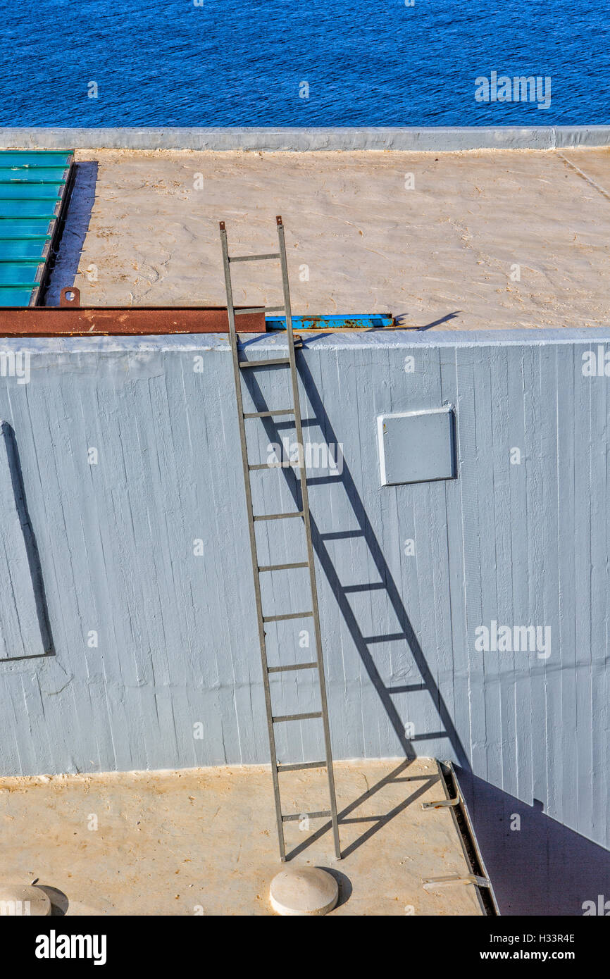 Abstraction. Stairway, shadow, building, sea. Stock Photo