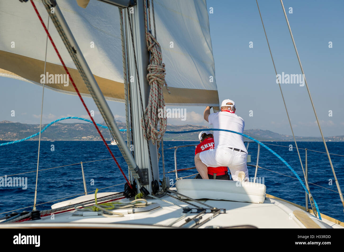 Crew work at sailing race Stock Photo Alamy