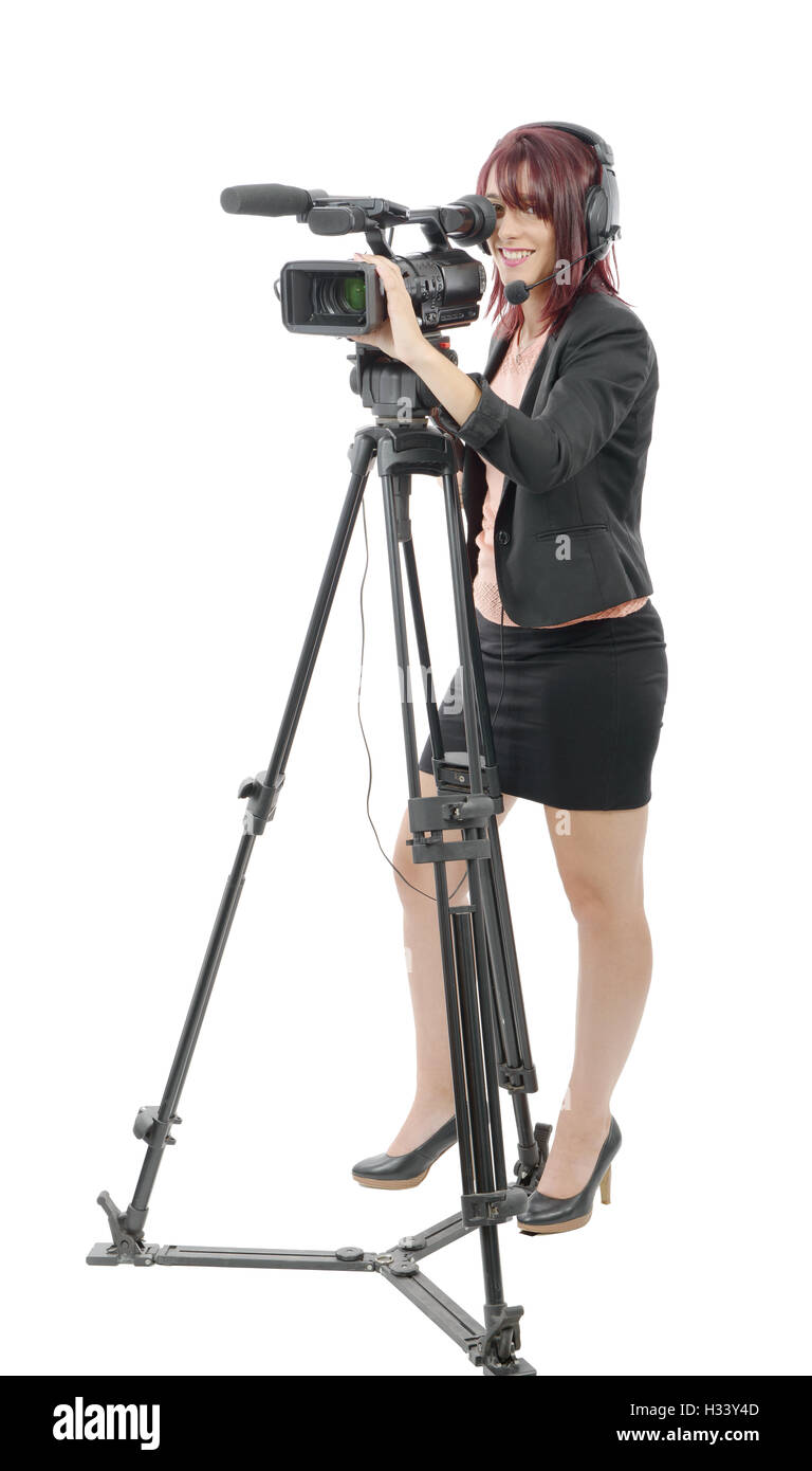 a beautiful young woman with a professional video camera and headphone ...